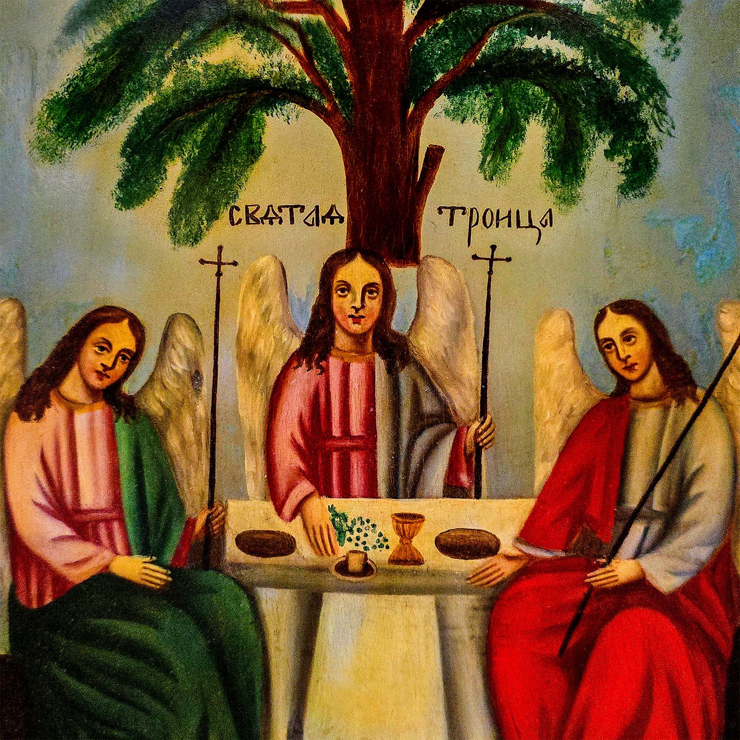 Closeup detail photo of archival print of the 19th Century Russian Orthodox Icon, "The Old Testament Trinity" (СВЯТАЯ ТРОИЦА), framed in white. Large format (62x78cm). www.arthodox.com