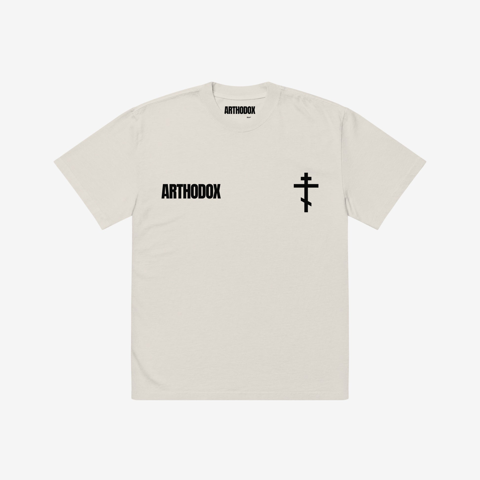 Faded bone T-shirt featuring the minimalist ARTHODOX wordmark on the left chest and an Orthodox Christian cross on the right. www.arthodox.com