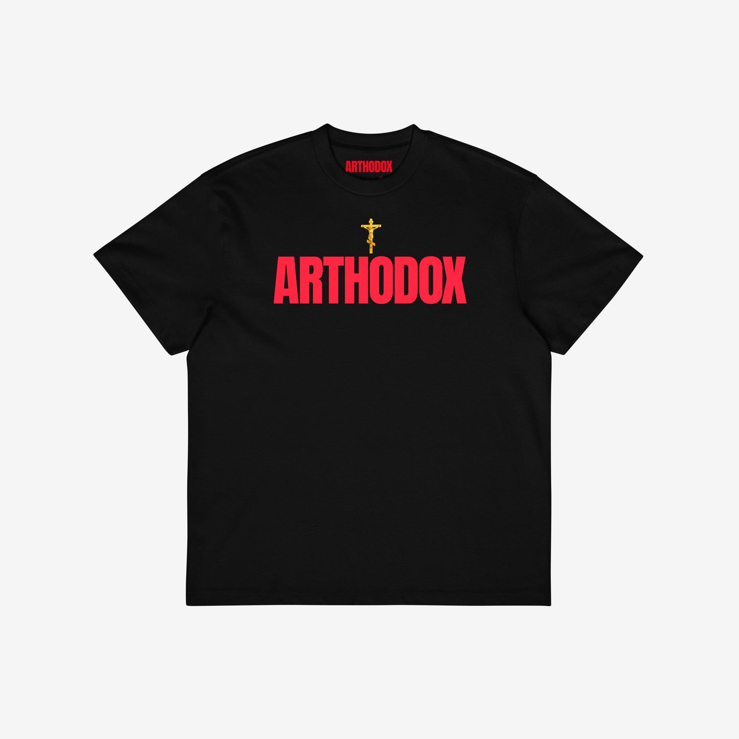 Black unisex oversized tee with a golden Orthodox Christian cross and bold red text ARTHODOX. www.arthodox.com