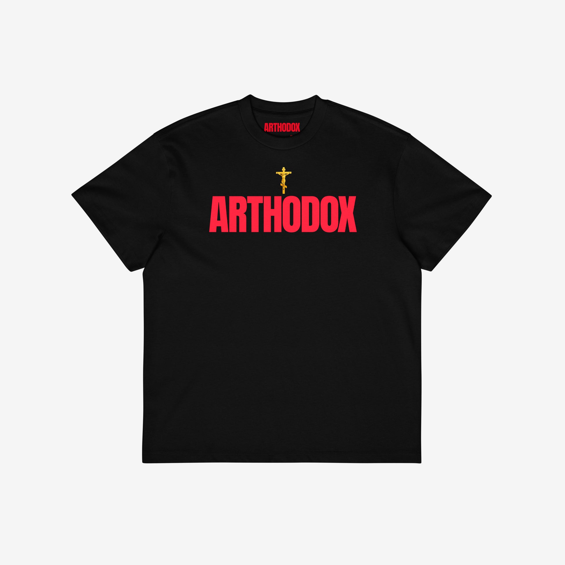 Black unisex oversized tee with a golden Orthodox Christian cross and bold red text ARTHODOX. www.arthodox.com