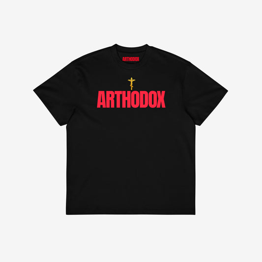 Black unisex oversized tee with a golden Orthodox Christian cross and bold red text ARTHODOX. www.arthodox.com