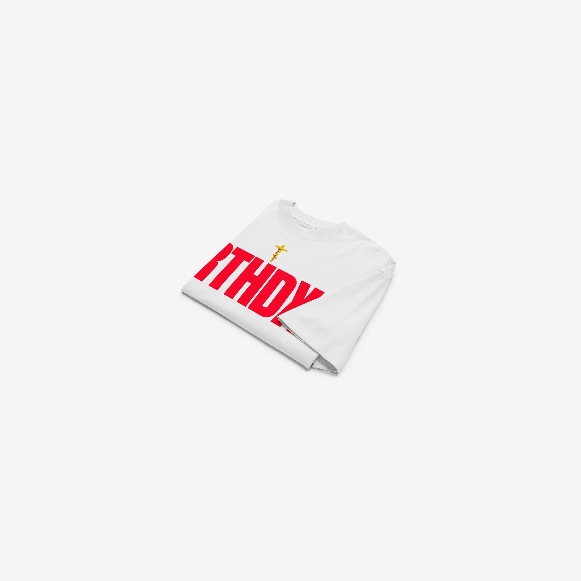 White unisex oversized high-neck tee featuring a golden Orthodox Christian cross and bold red disemvowelled ARTHODOX, RTHDX. Folded. www.arthodox.com