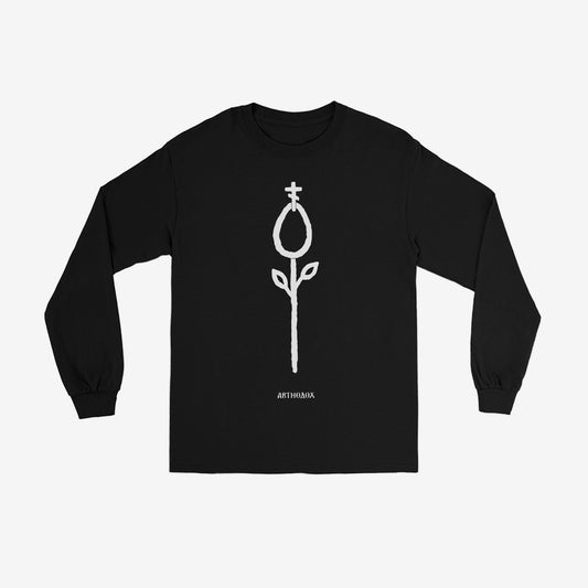 Black unisex long sleeve t-shirt with a minimalist Poppy flower and Orthodox cross design, showcasing the Modern Orthodox style. www.arthodox.com