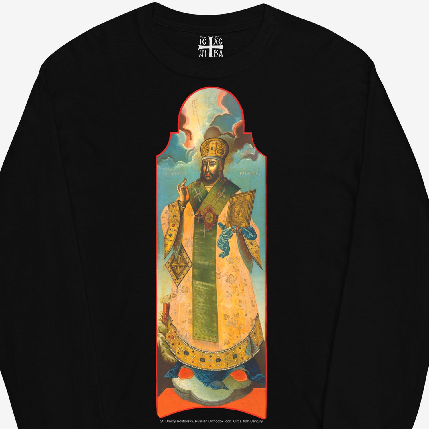 Black unisex longsleeve T-shirt with large print of rare Russian Orthodox church icon St Dmitry Rostovsky. Closeup photo with NIKA cross seen on the necktag. www.arthodox.com